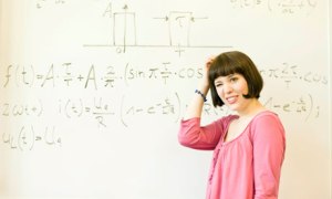 confused woman with maths