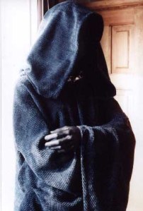 cloaked man